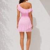 Robe cocktail rose poudré asymétrique