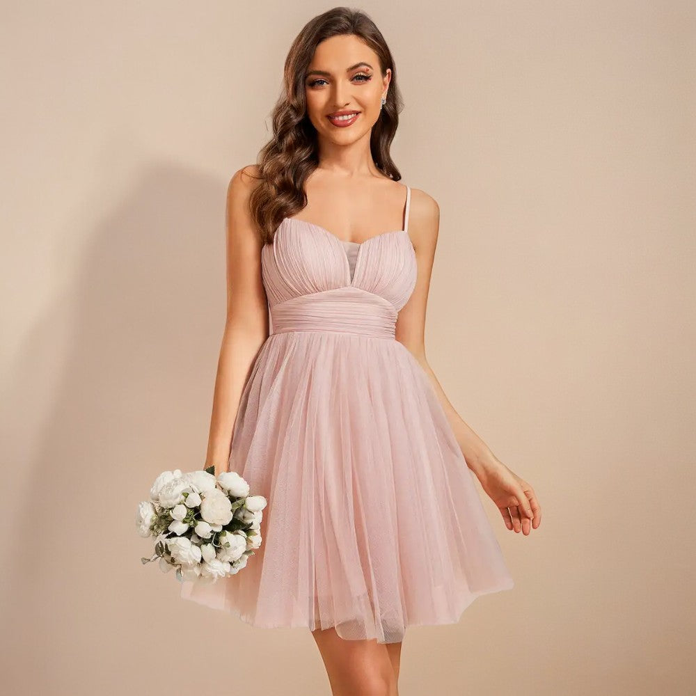 Robe courte rose poudré mariage sale